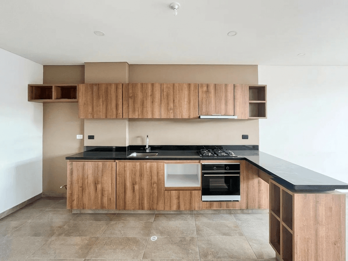 Modern minimalist kitchen interior, clean lines, warm wood tones